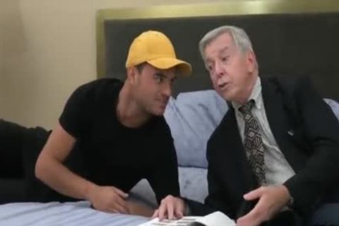 handsome old Grey Haired American Teacher And His Student