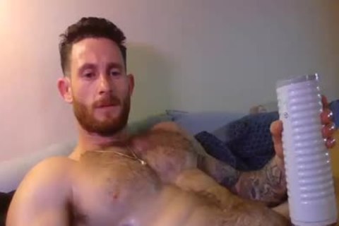 brawny lad Masturbating His cock With A Fleshlight